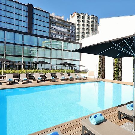Iberostar Selection Lisboa Hotel Exterior foto The swimming pool at the hotel