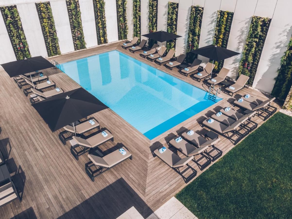 Iberostar Selection Lisboa Hotel Exterior foto The pool at the hotel