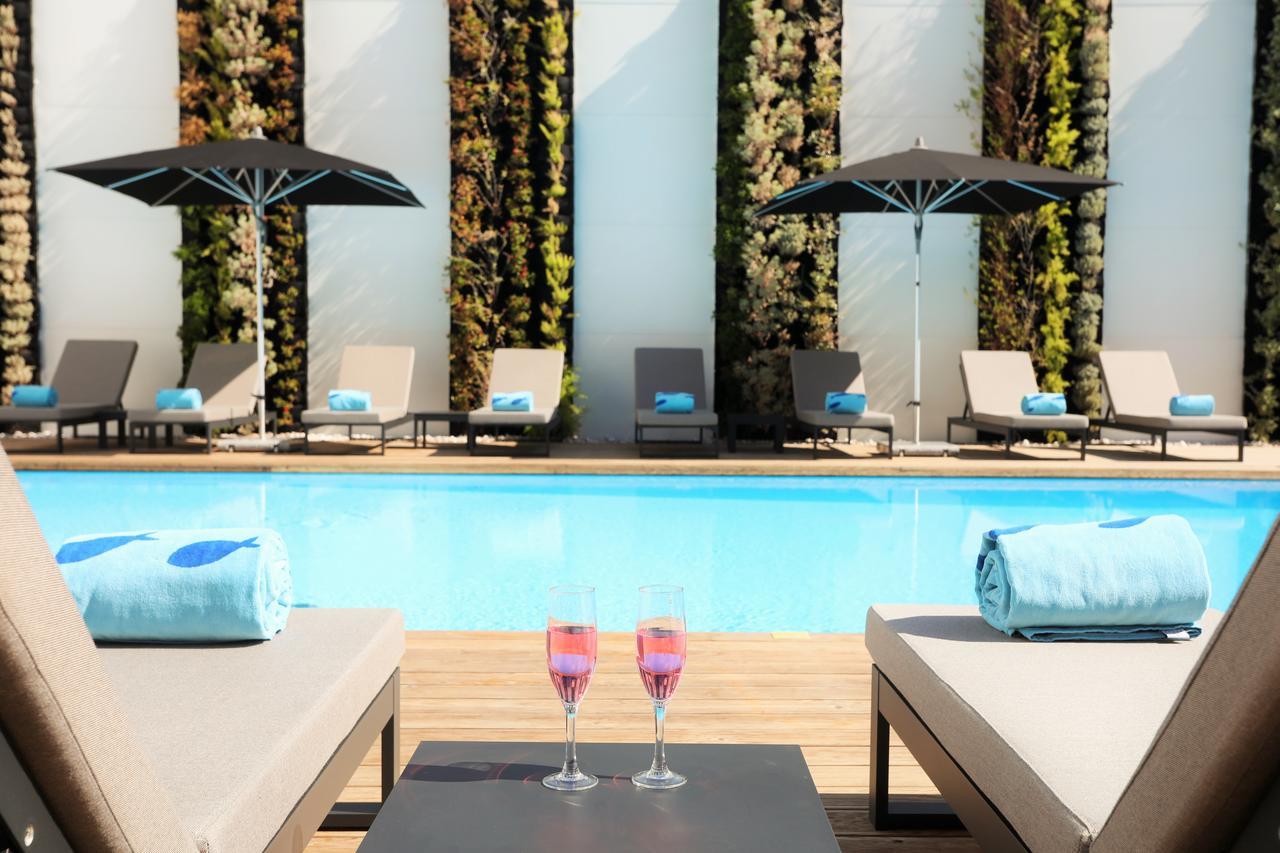 Iberostar Selection Lisboa Hotel Exterior foto The pool at the hotel